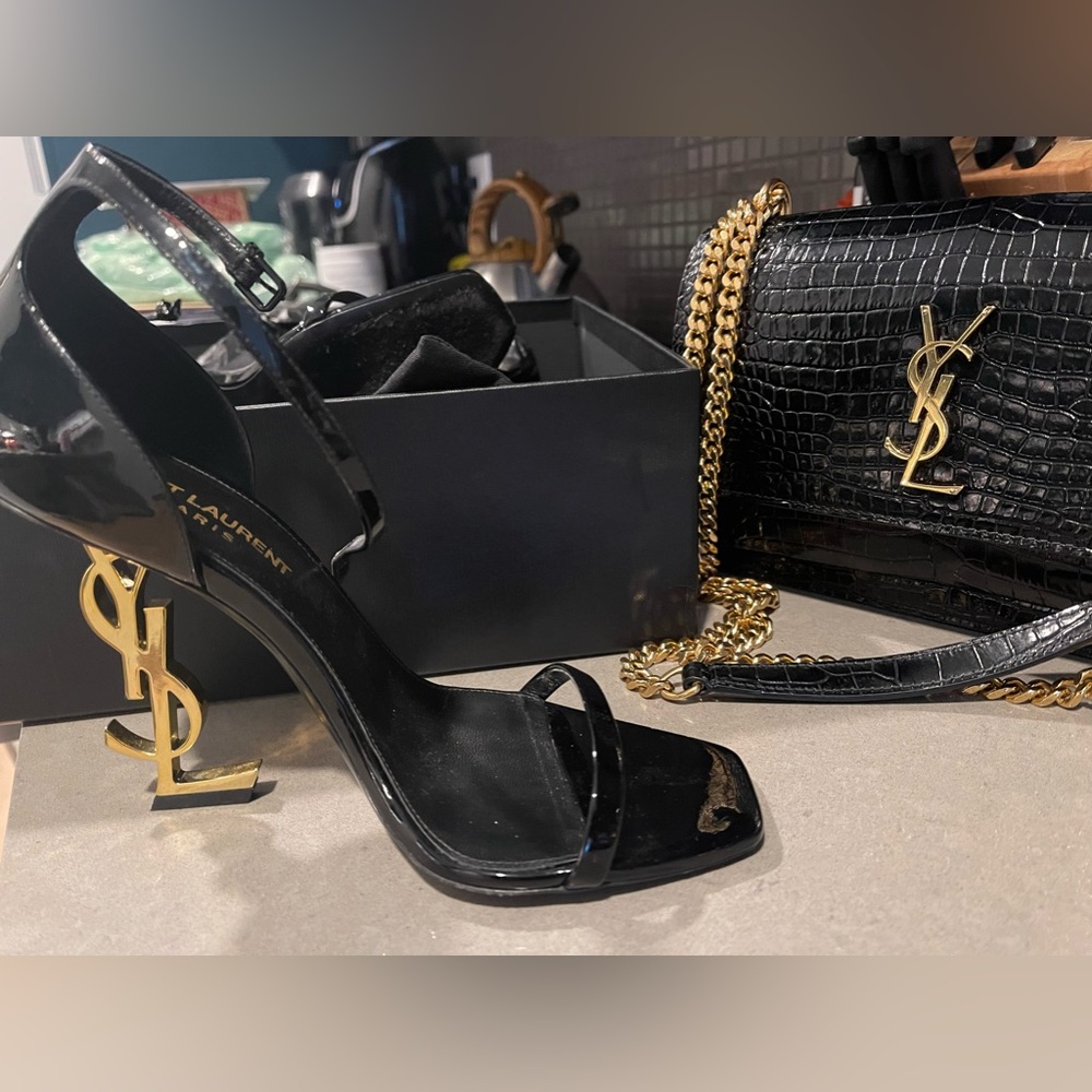 YSL BLACK SIZE 37 worn twice. Purchased to match bag. Too tight on my foot :(